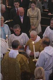 Photo of the Deacon proclaiming the Gospel.